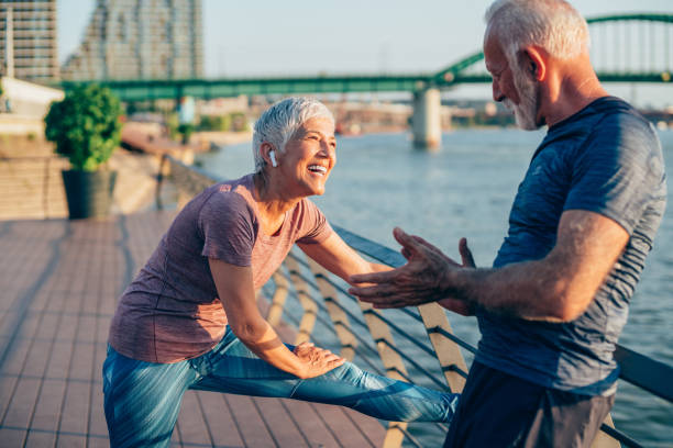istock Senior couple stretching outdoors 1226681961
