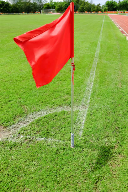 istock Soccer field with a corner red flag and flag pole. 1226682800
