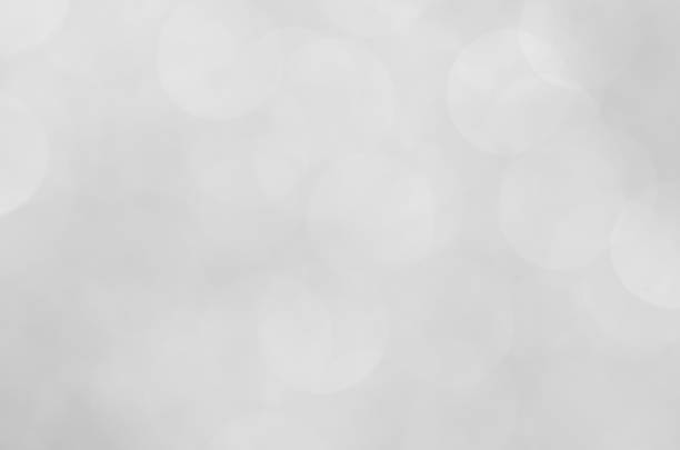 istock abstract white blur bokeh glitter sparkle no color background. 1226684290
