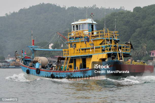 Malaysian Fishing Boat Close Up Stock Photo - Download Image Now - Business, Coastline, Fish