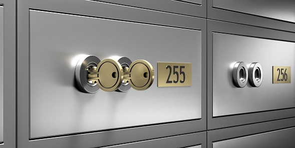 Safe deposit box closeup. Closed metal bank locker number 255 with gold keys, valuables deposited safely. 3d illustration