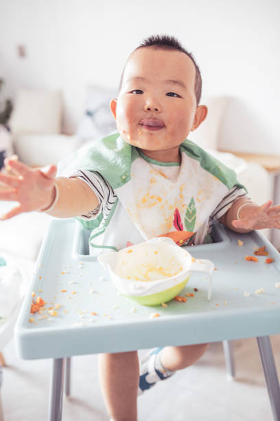istock Little baby want eating more food 1226694792
