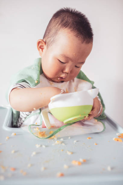 istock Mischief baby when eating food 1226694794