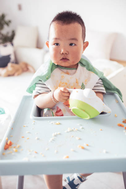 istock Mischief baby when eating food 1226694797