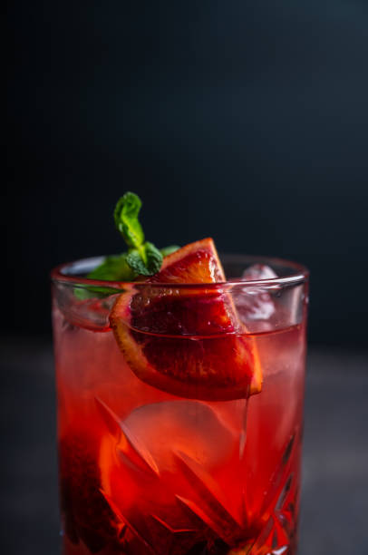 istock Red cocktail with blood oranges and thyme on the rustic background 1226696238