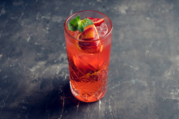 istock Red cocktail with blood oranges and thyme on the rustic background 1226696240