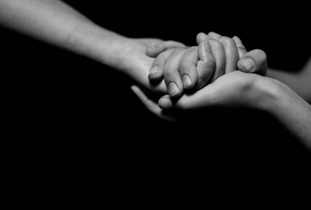 istock Mother and daughter holding hands. Helping hands. 1226696996