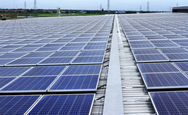 istock Big Warehouse Roof Covered with Solar Panels 1226698637