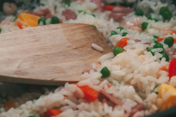 istock Rice three delights with the wooden cooking spade. 1226700431