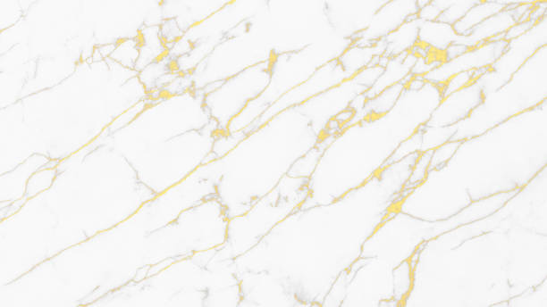 Golden and white marble stone texture for background.