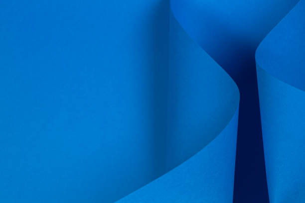 istock Abstract geometric shape blue color paper background 1226701399