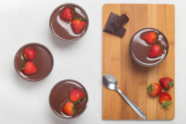 istock Chocolate dessert with layered mascarpone, decorated with strawberries. 1226704096