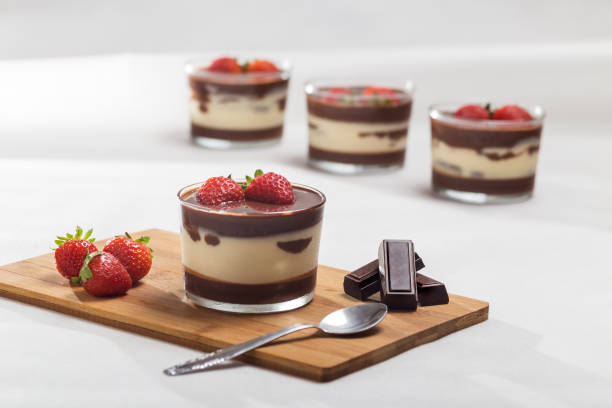 istock Chocolate dessert with layered mascarpone, decorated with strawberries. 1226704172