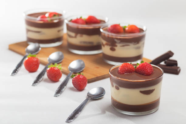 istock Chocolate dessert with layered mascarpone, decorated with strawberries. 1226704200