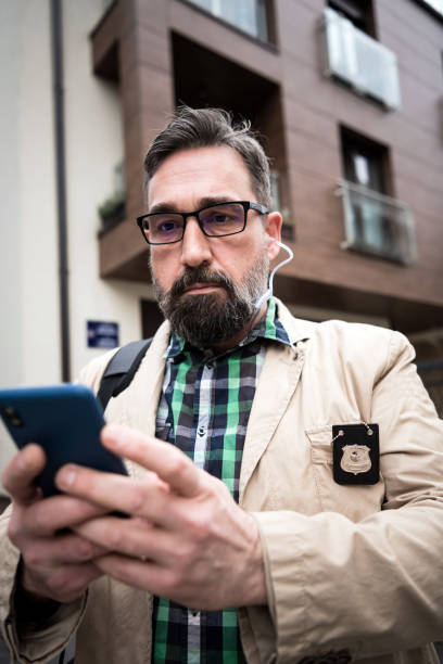 istock The detective collects important information from a mobile phone 1226710945