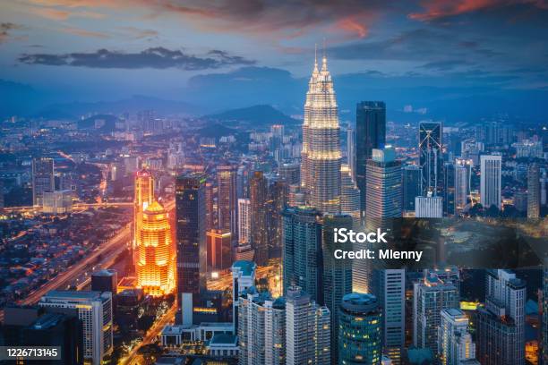 Petronas Twin Towers Sunset Twilight Kuala Lumpur Illuminated Cityscape Stock Photo - Download Image Now