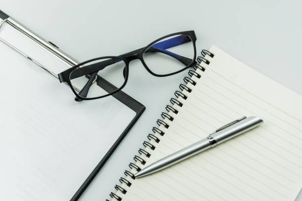 istock close up of office table on gray background 1226718704