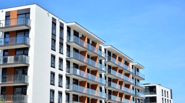 istock Modern condo building with big windows and modern facade. 1226721403
