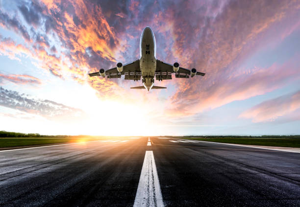 istock Passenger airplane taking of at sunrise 1226724908