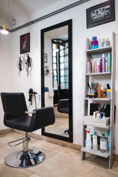 istock Empty hair salon interior with chairs and mirrors. 1226724926