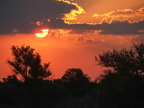 Sunset in the Northern Cape in South during the summer with incoming thunderstorm