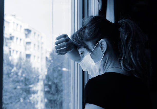 istock Quarantine woman at home 1226731013