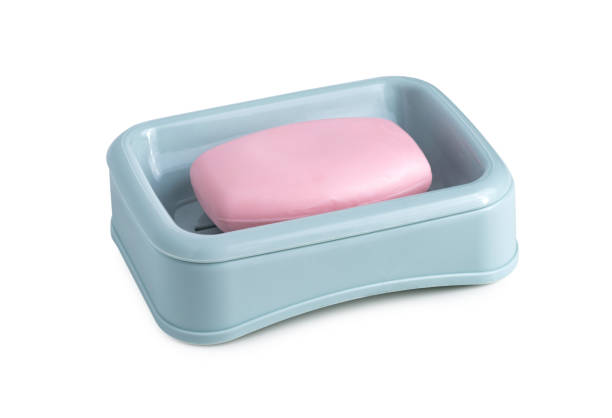 istock plastic blue soap holder with pink soap on white background 1226735087