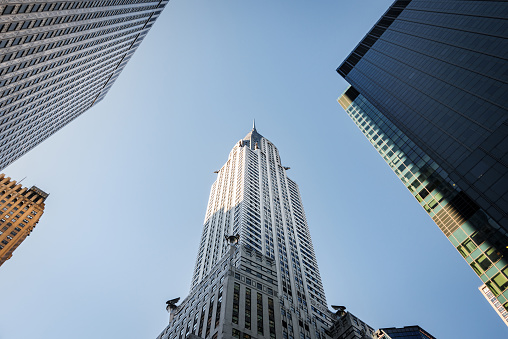 Low angle view of the Chrysler building in New York City, one of the best examples of Art Deco skyscrapers worldwide.