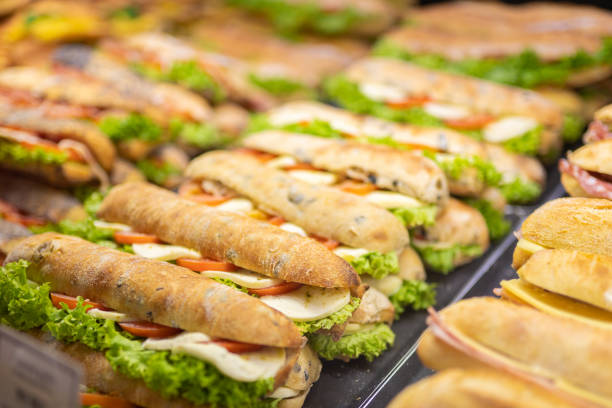 Picture of Various sandwiches on a shop counter Various sandwiches on a shop counter sandwich platter stock pictures, royalty-free photos & images