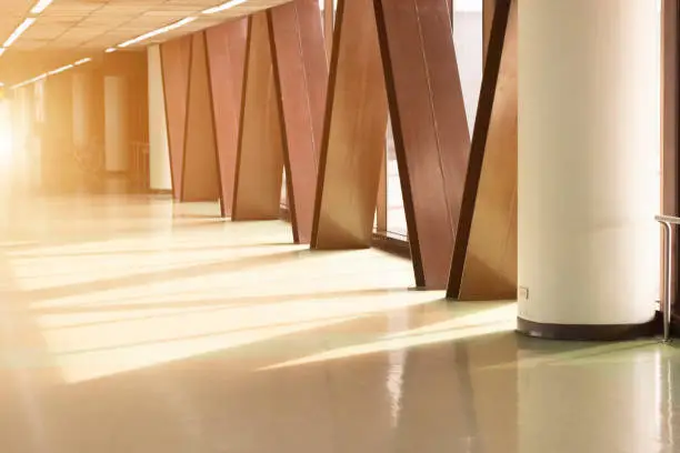 Photo of Sunlight shining the walkway in the airport terminal building