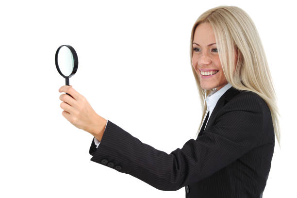 istock Business woman with magnifier 1226742212