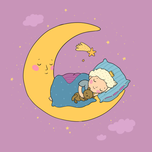 istock The little prince is sleeping on the moon. Cute cartoon boy in bed. 1226743616