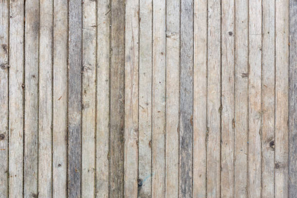 istock flat texture and background of vertical gray thin solid wooden planks - old, dry and dusty 1226744603