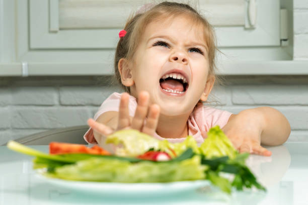 istock little girl refuses vegetables 1226744746