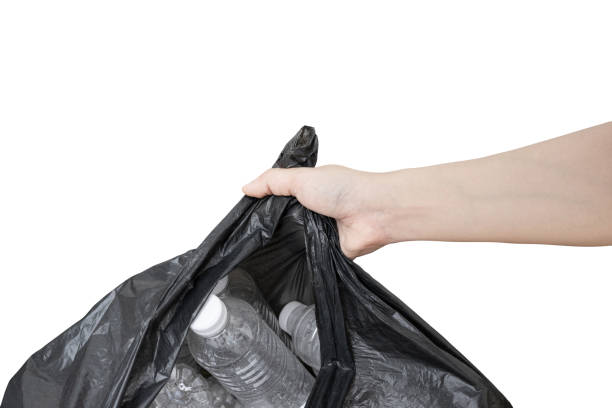 istock Hand woman holding a Garbage bag(Waste recycling) on white background with clipping path. 1226746106
