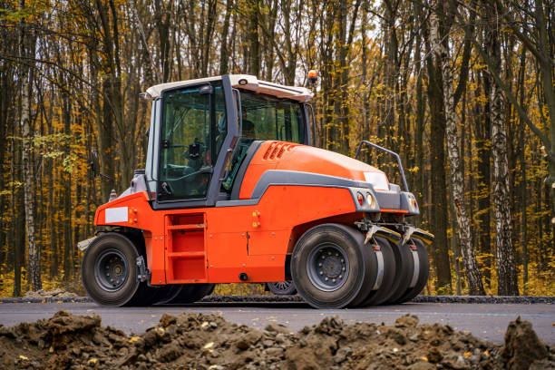 istock Road repair, compactor lays asphalt. 1226748959