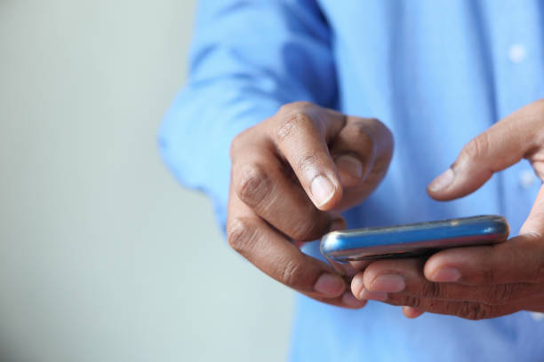 istock Close up of a man using mobile smart phone 1226749967