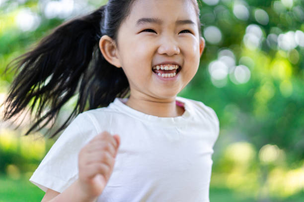 istock Cute little Girl Running 1226753542