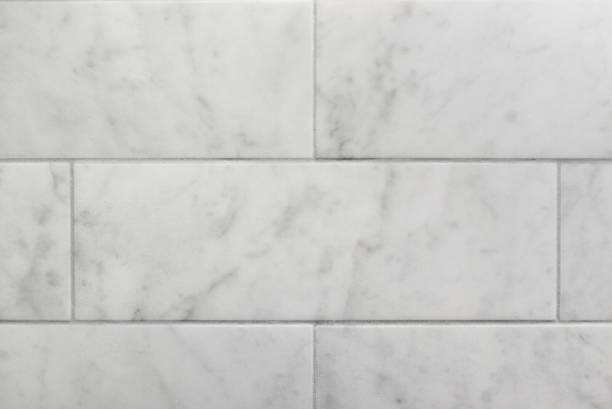 istock closeup of subway tile carrara marble wall background 1226757584