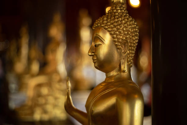 istock Golden Buddha as bubble bokeh as background 1226759918