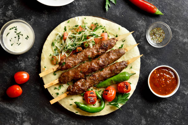 istock Turkish Adana Kebab with fresh vegetables 1226759994