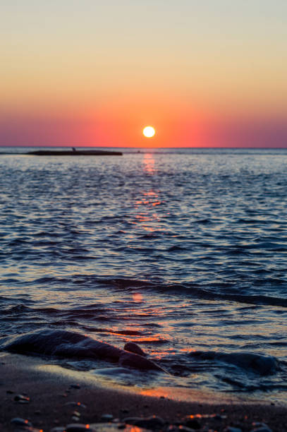 istock Amazing sea sunset, the sun, waves, clouds 1226760670