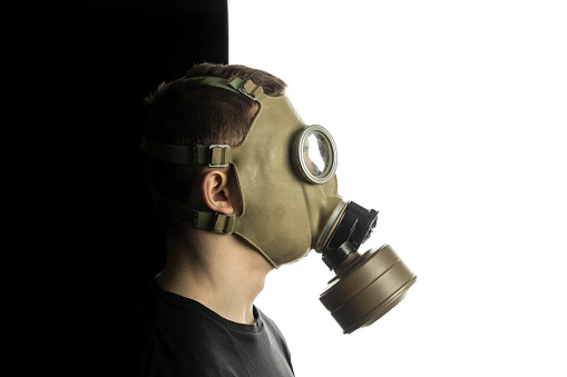 a teenager wearing a protective mask