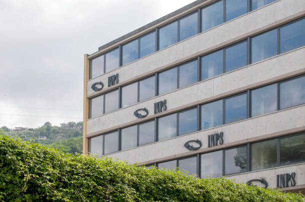 A building of the INPS, the national social security institute that deals with providing pensions and collecting labor contributions Carrara, Italy - May 24, 2020 - A building of the INPS, the national social security institute that deals with providing pensions and collecting labor contributions cristian stock pictures, royalty-free photos & images