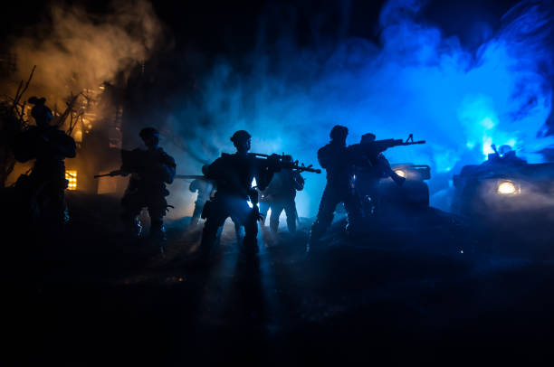 war concept. battle scene on war fog sky background, fighting silhouettes below cloudy skyline at night. - car individuality military 4x4 imagens e fotografias de stock