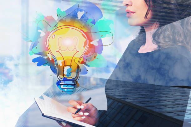 istock Woman with notebook in office and her bright idea 1226763155