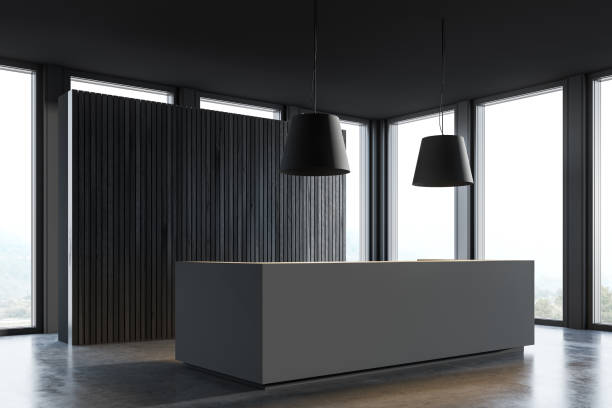 istock Gray reception desk in dark wooden office corner 1226764593
