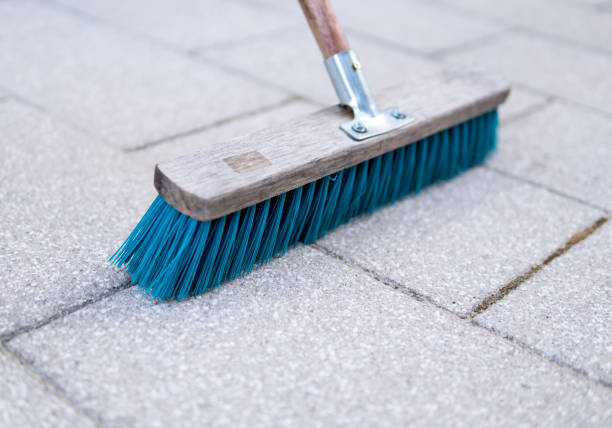 istock blue brush used for cleaning pavemnet 1226766641