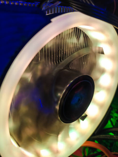 istock Modern computer air cooling with multi-colored led backlight-fans, cooling radiators, cables, boards, close-up, macro. 1226767299