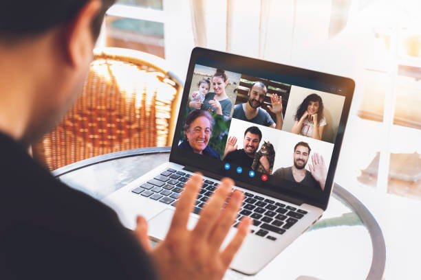 istock Laptop webcam screen view multiethnic families contacting distantly by video conference. Living abroad four diverse friends making video call enjoy communication, virtual interaction modern app concept 1226768797